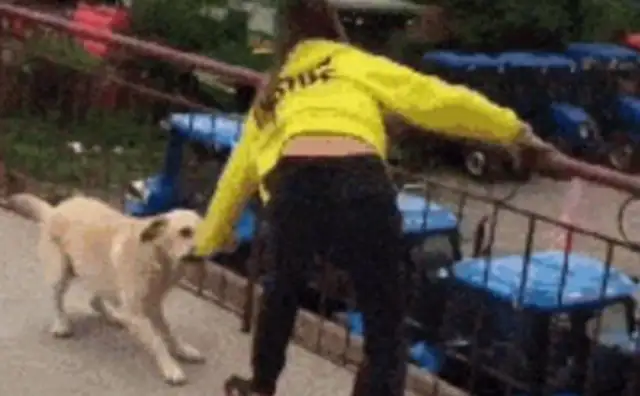 A woman pretending to jump off a building and commit suicide