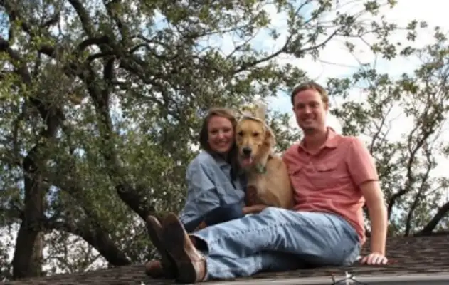 A dog wanders on the roof, and everyone's worried about filming the door, and they find a notice, and they laugh