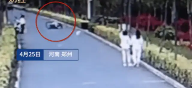 The dog's not tied up to break the bike boy's bones. The dog owner's reaction is making the net
