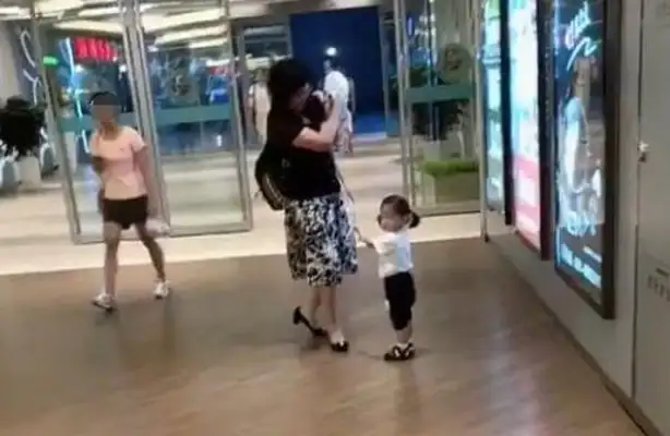 The little girl picked up Grandma with the dog, and she picked up the dog, girl: It's real