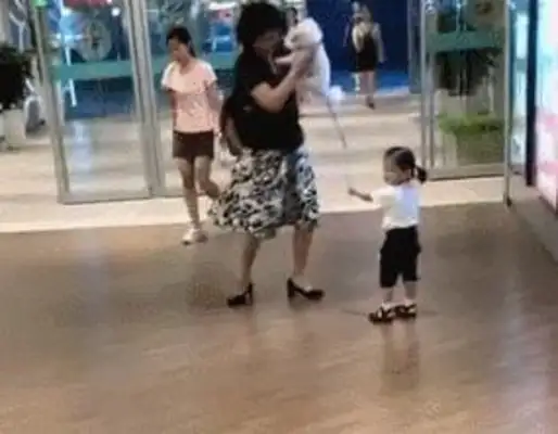 The little girl picked up Grandma with the dog, and she picked up the dog, girl: It's real