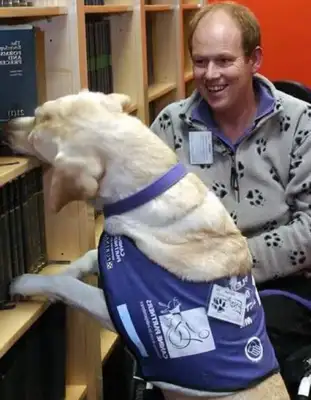 DOGS LEARN TO READ MEDICAL RECORDS, USE HUMAN SKILLS LIKE ATMS, ALL BECAUSE THEY LOVE THEIR MASTER