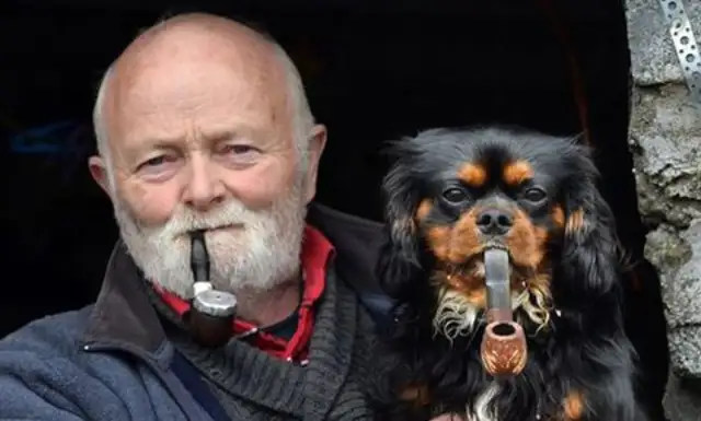 A man gave up smoking to pet dogs because he was sick