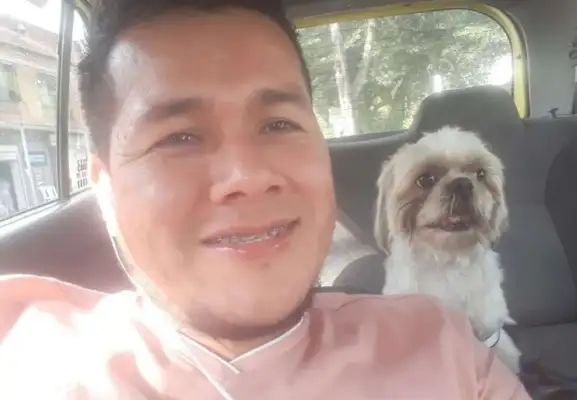 The passenger didn't pay the dog to pay the debt. The driver's down: I got a dog
