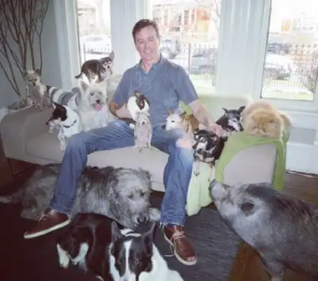 The men of America built a family of 10 dogs, 4 birds, 2 cats, 1 rabbit and a fish